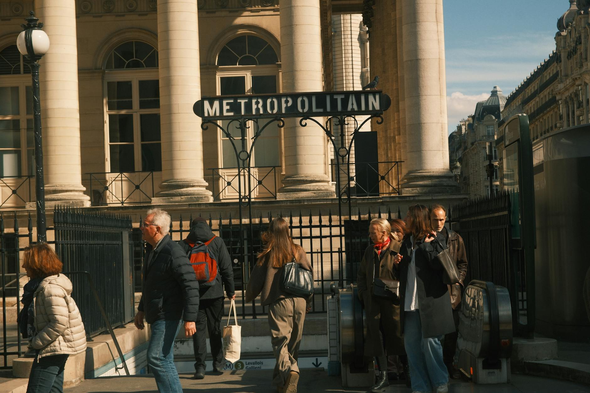 Evening scene near the Eiffel Tower with visitors in smart-casual outfits