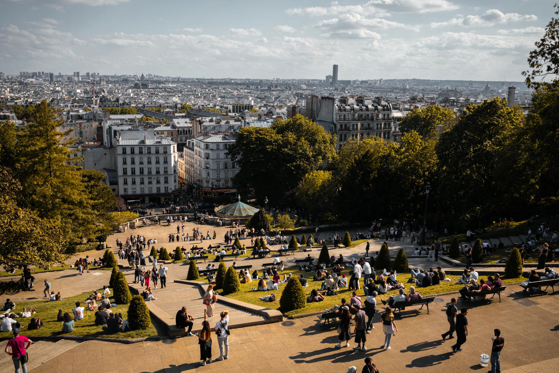 Panoramic view of Paris skyline with the Eiffel Tower at golden hour showing why visitors need multiple days to explore